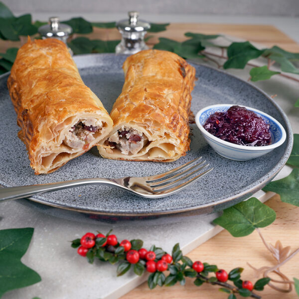 Foot long pork, chicken, stuffing and cranberry sausage roll, cut in half