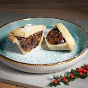 mince pie on a plate cut in half